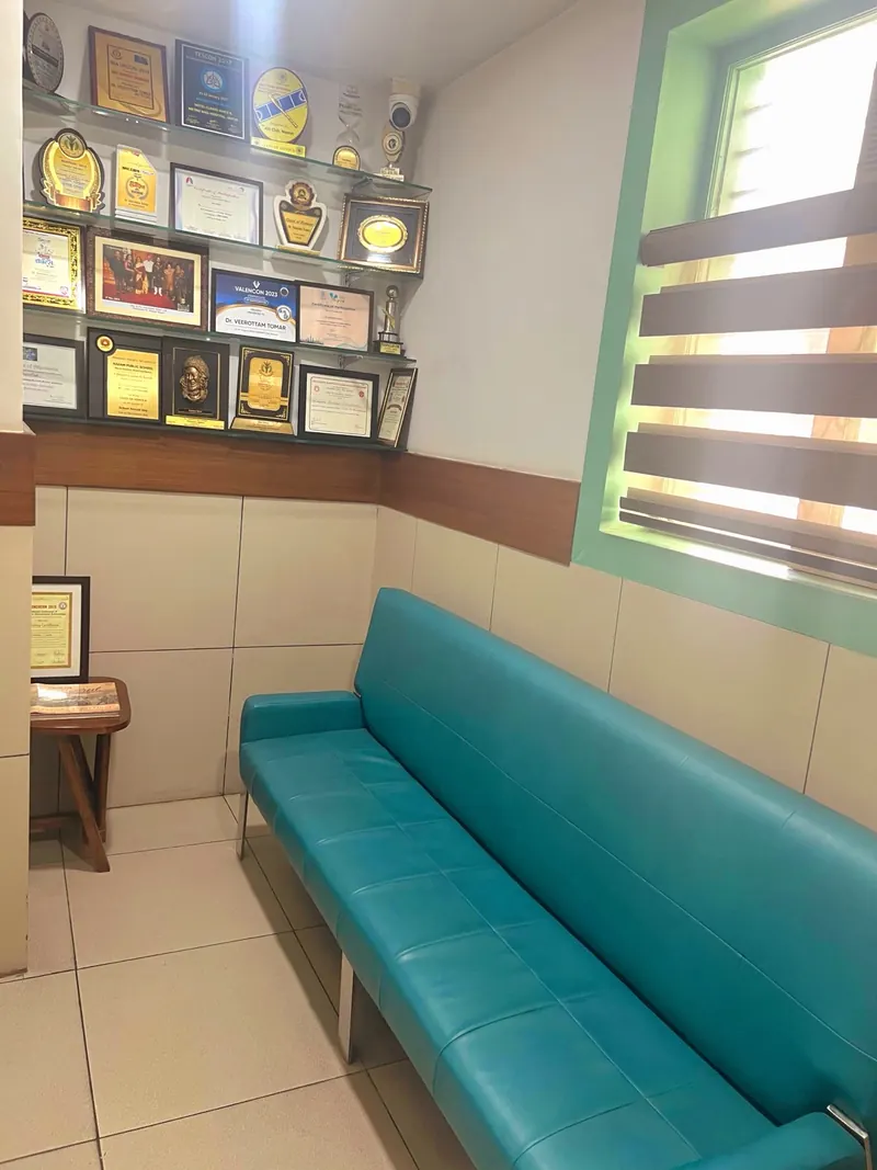 Citations and awards above the waiting sofa