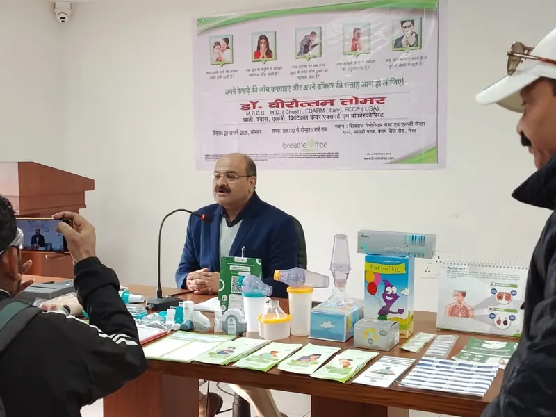 Dr. Tomer speaking at an awareness camp