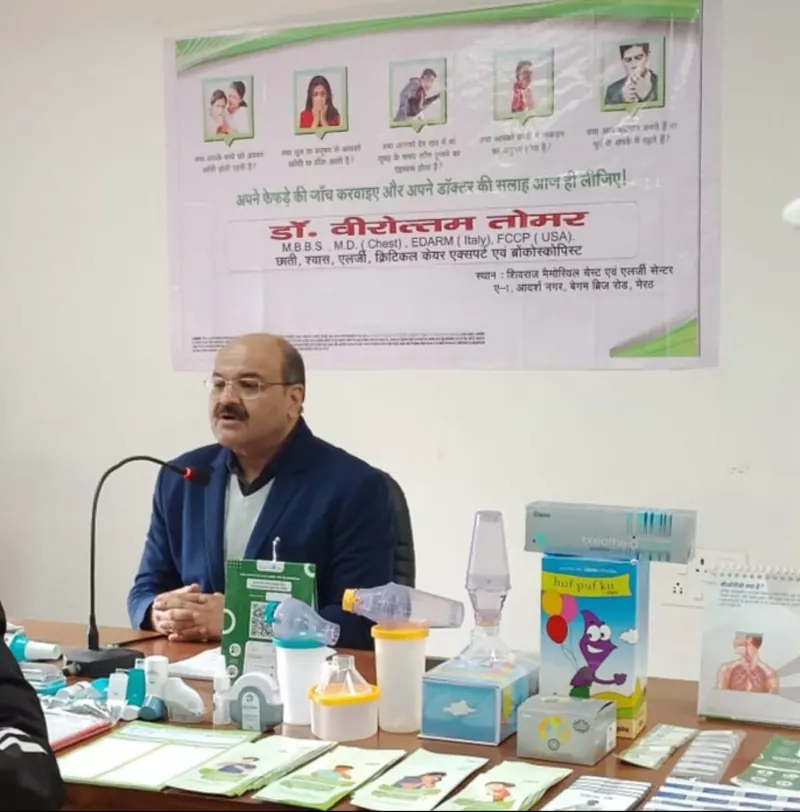 Dr. Tomer at a chest-health awareness camp table