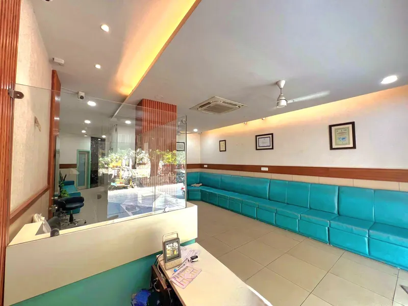 The waiting lounge with teal sofas